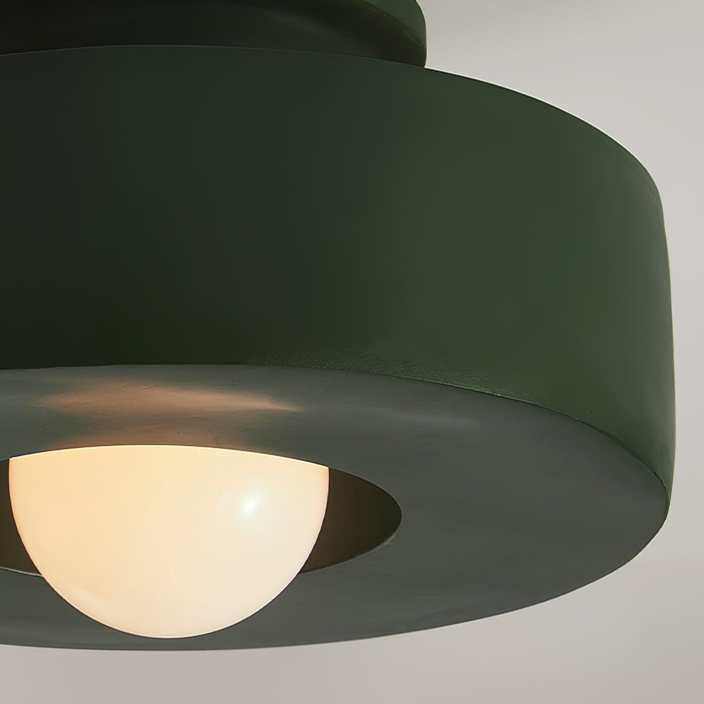 Plafonnier cylindrique à source lumineuse apparente