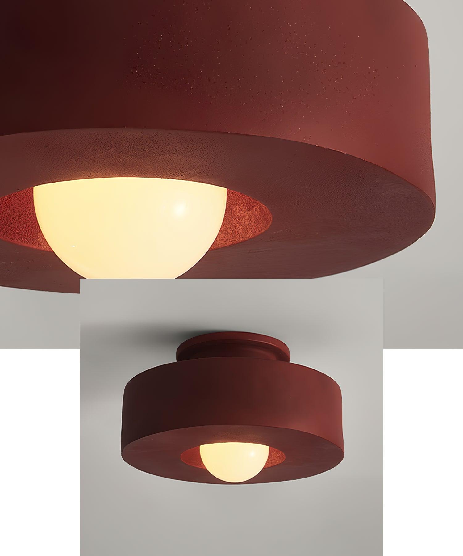 Plafonnier cylindrique à source lumineuse apparente